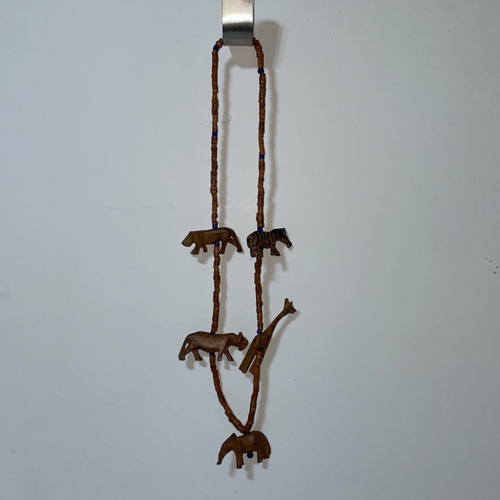Source Unknown Brown and Blue Carved Animal Bead Necklace